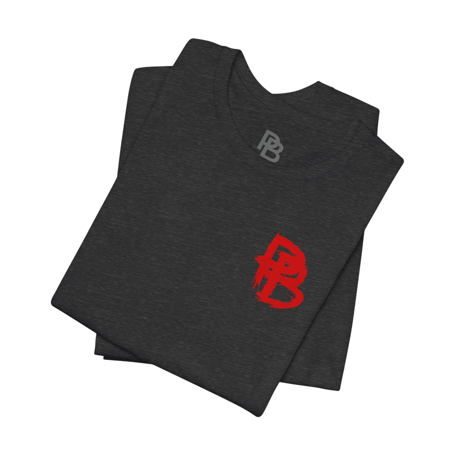 Black skull graphic T-shirt from Printify featuring bold "Built From What Others Refused" design on the front.
