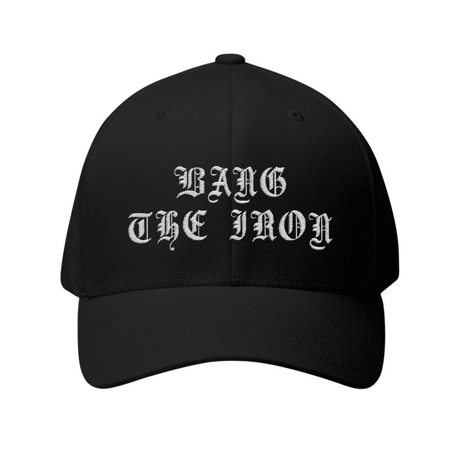 DailyThreadCo. black structured FlexFit cap with white gothic embroidery reading Bang the Iron on the front.