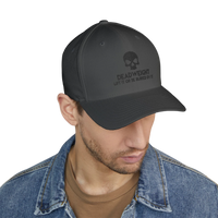 DailyThreadCo. black structured cap with embroidered skull and Deadweight text worn by a man in a denim jacket.