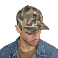 DailyThreadCo. camo baseball cap with skull embroidery and Deadweight slogan worn by a man in a denim jacket.