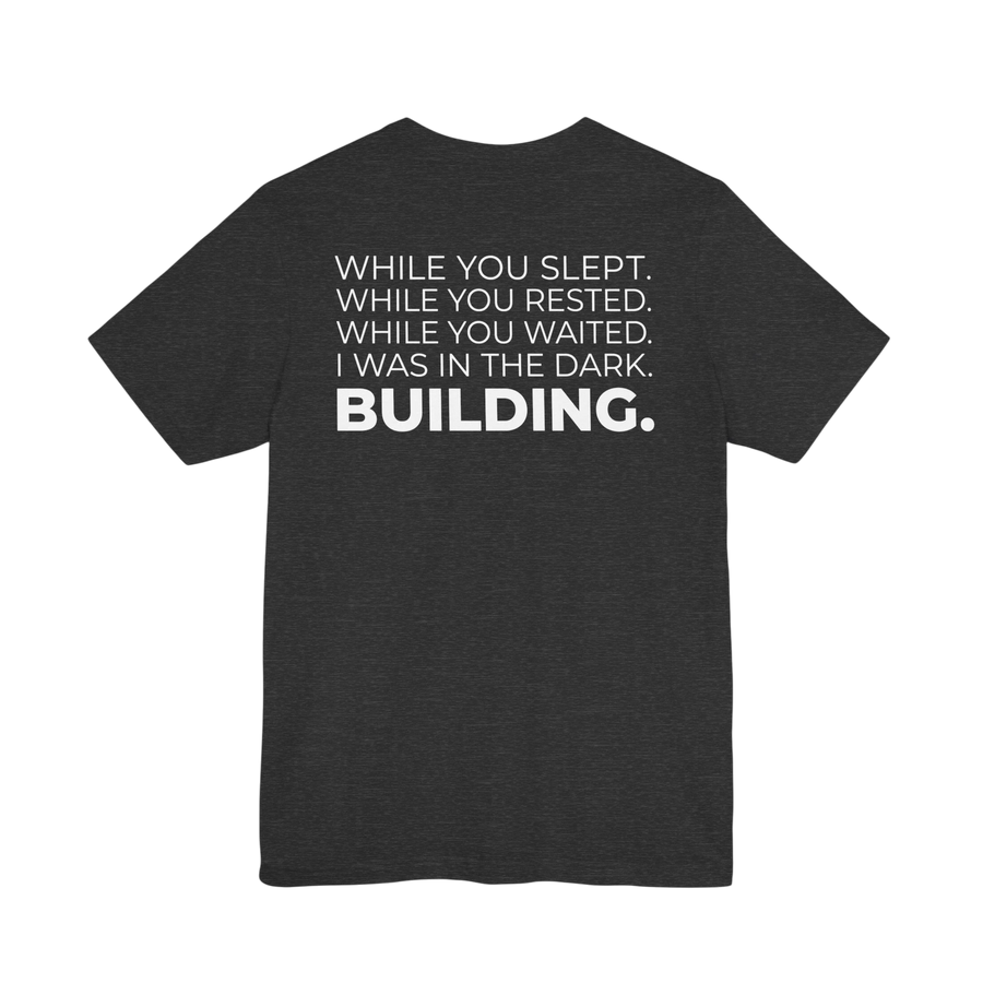 DailyThreadCo. charcoal grey cotton t-shirt with white motivational typography on the back.