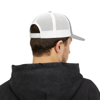 DailyThreadCo. Deadweight trucker cap with white mesh back and grey front, viewed from behind on a man in a black hoodie.