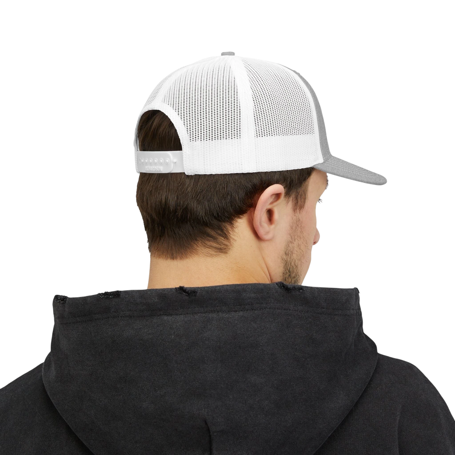 DailyThreadCo. Deadweight trucker cap with white mesh back and grey front, viewed from behind on a man in a black hoodie.