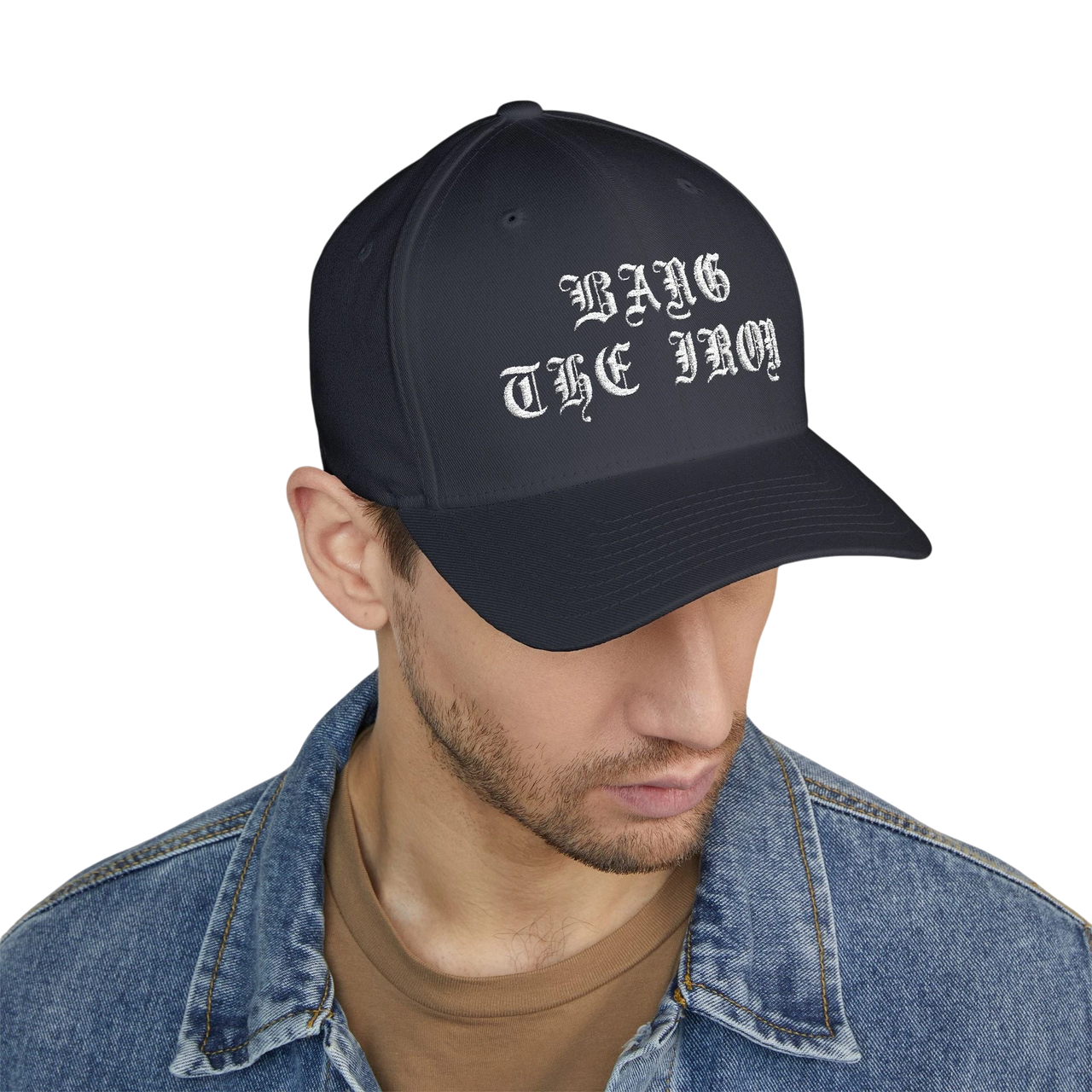 DailyThreadCo. structured FlexFit cap in black with white Bang the Iron gothic embroidery worn by a man.