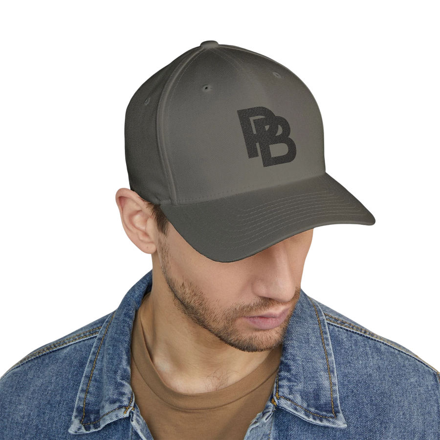 DailyThreadCo. structured grey FlexFit baseball cap with embroidered logo, worn by a man in a denim jacket.