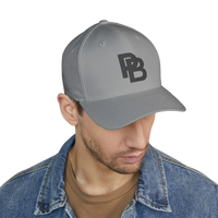 DailyThreadCo. grey structured FlexFit baseball cap with Plate Bangers logo embroidery worn by a man in a denim jacket.