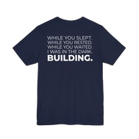 DailyThreadCo. navy blue cotton t-shirt with white motivational text printed on the back.