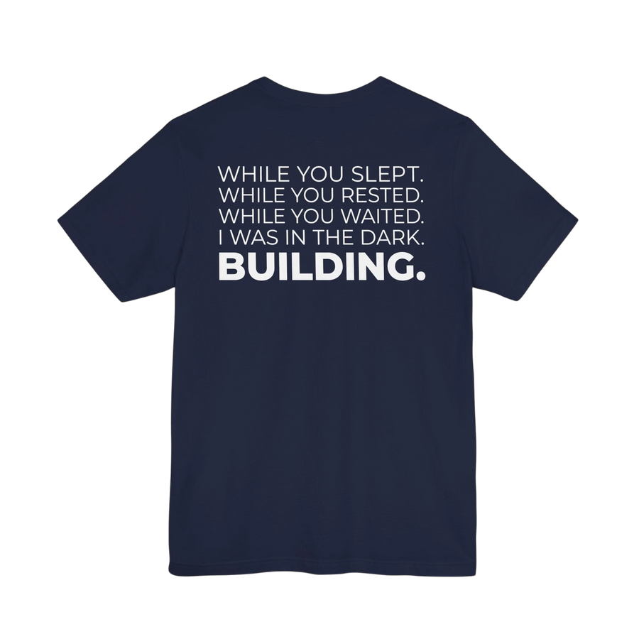 DailyThreadCo. navy blue cotton t-shirt with white motivational text printed on the back.