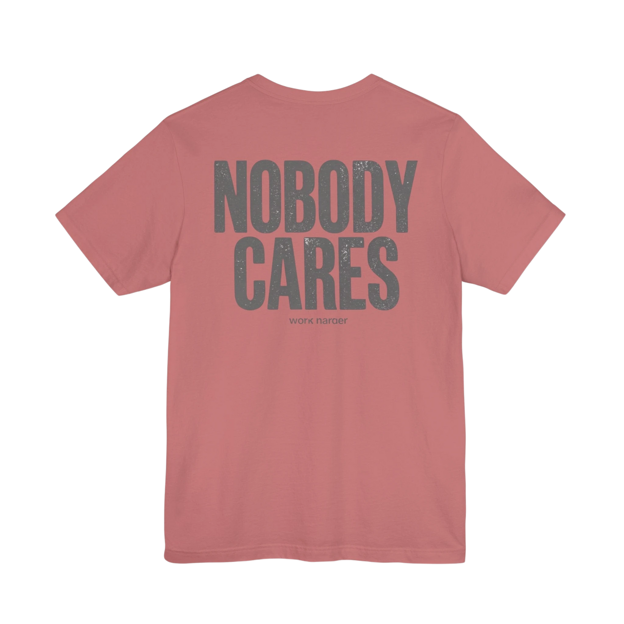 DailyThreadCo. dusty rose graphic t-shirt with Nobody Cares text in grey on the back, made from soft cotton.