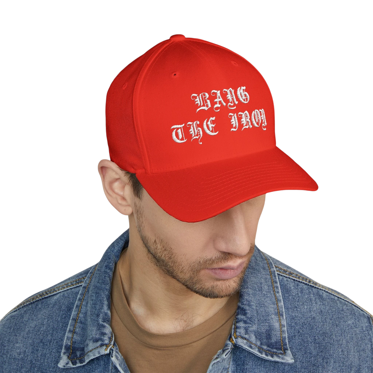 DailyThreadCo. red structured FlexFit cap with white Bang the Iron gothic embroidery worn by a man in a denim jacket.