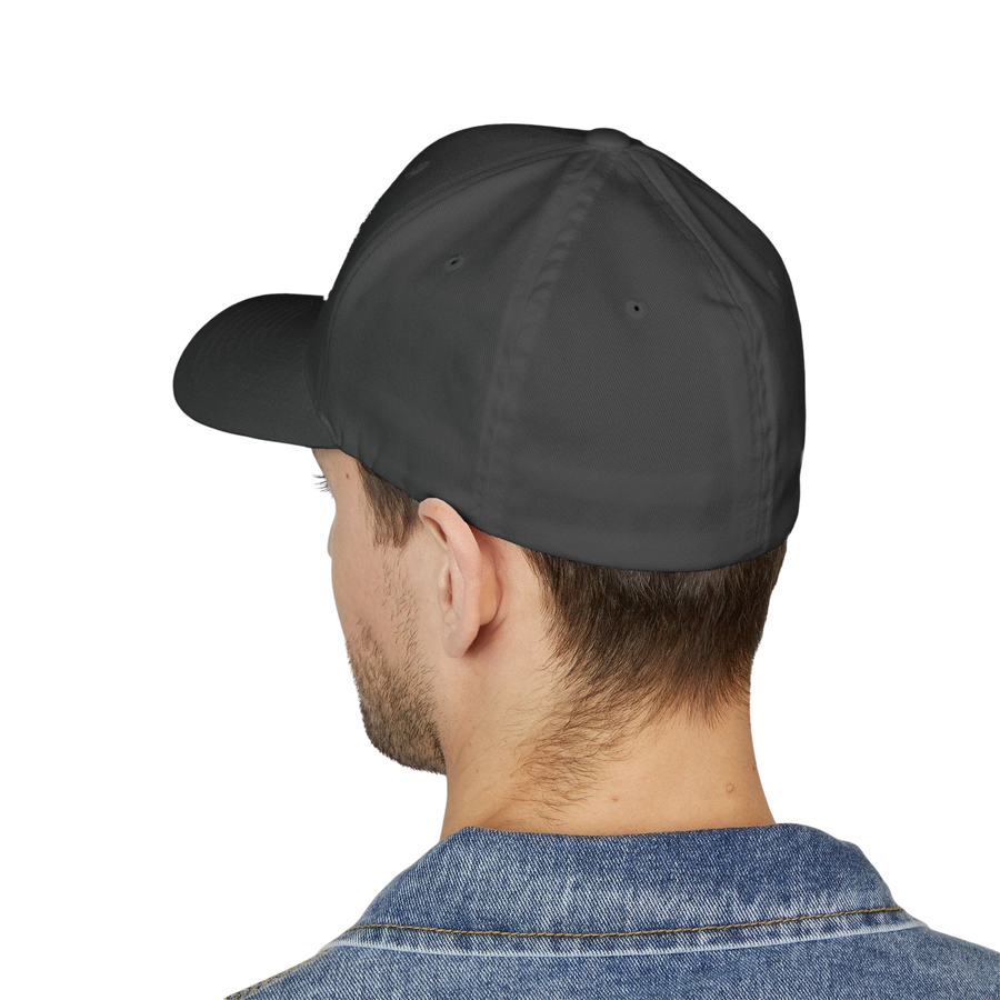 DailyThreadCo. structured FlexFit cap in dark grey twill worn by a man, showing the back view of the six-panel hat.
