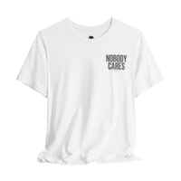 DailyThreadCo. white cotton graphic t-shirt featuring Nobody Cares text on the chest in a clean retail fit.