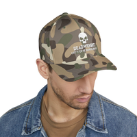 deadweightgymapparel. camo flexfit cap with distressed skull embroidery and Deadweight text on a man in a denim jacket.
