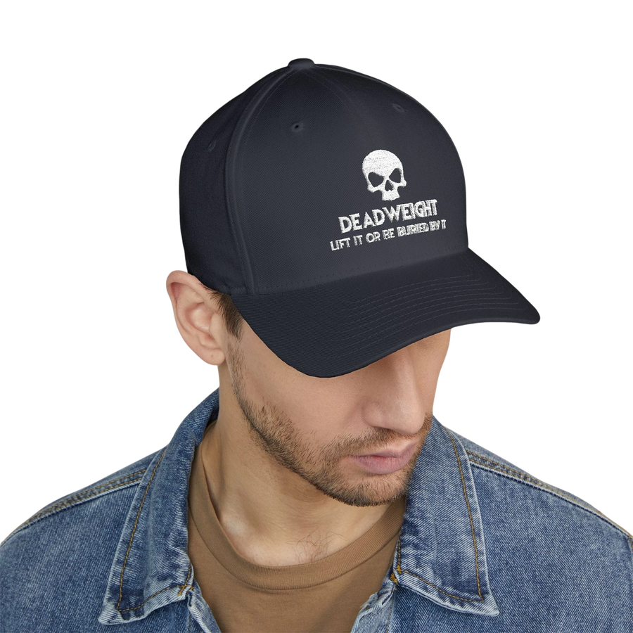 deadweightgymapparel. structured flexfit cap in dark grey with a distressed skull embroidery and bold text on the front.